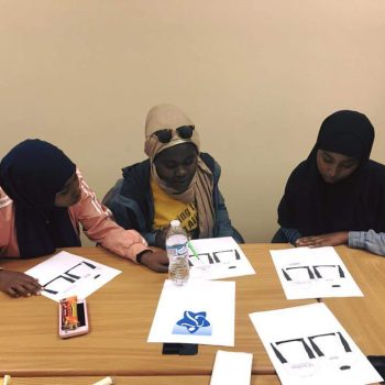 YAC members discuss options for conference T shirt designs